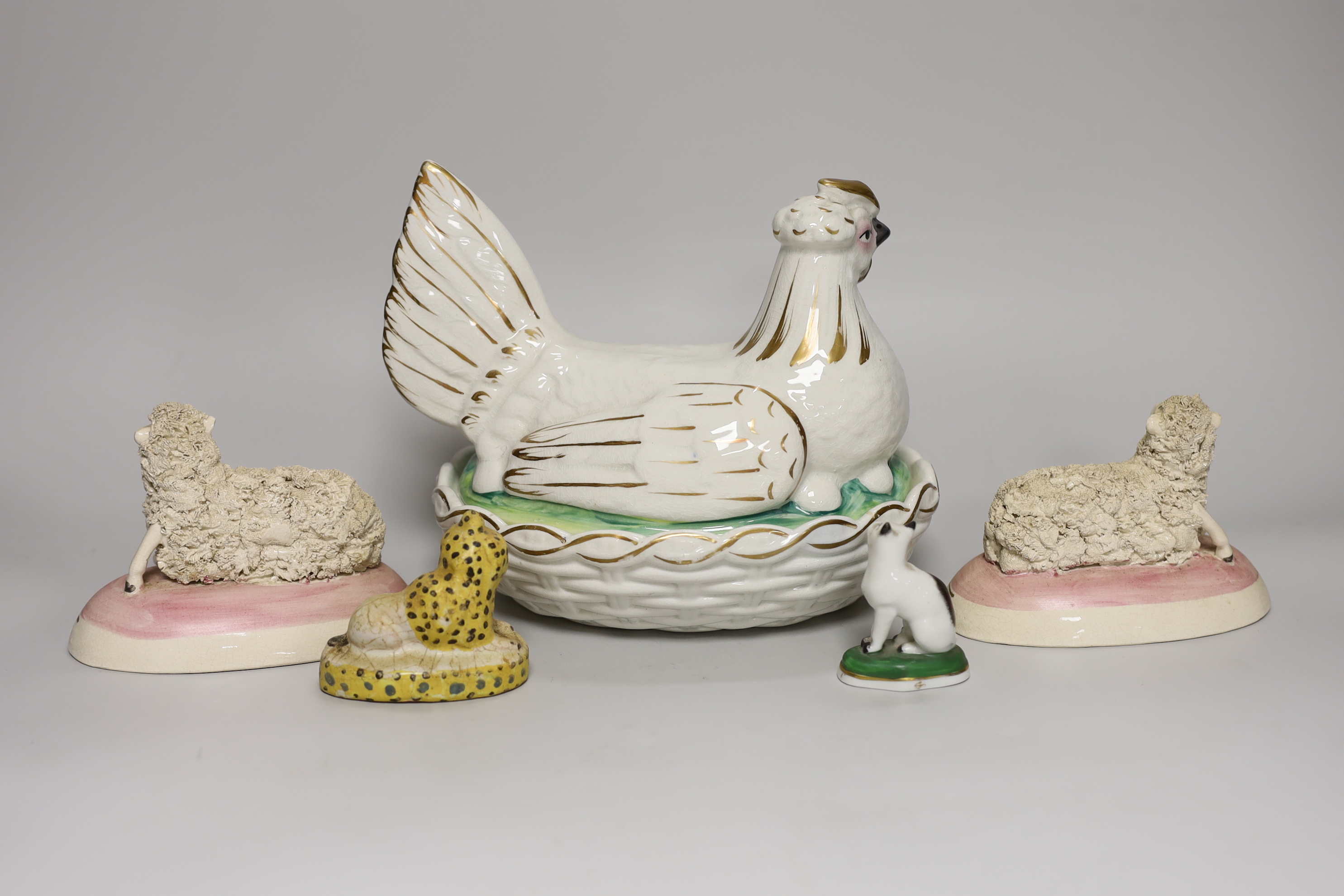 A Victorian earthenware chicken tureen, and four small ceramic animal models, tureen 18cm high